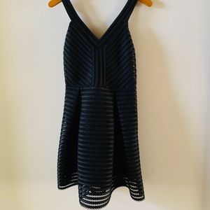 Express fit and flare dress with ruffle skirt.